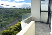 Flic en Flac for rent recent 2 bedroom apartment with swimming pool, gym, elevator and covered parking located in a secure residence.