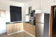 Flic en Flac for rent recent 2 bedroom apartment with swimming pool, gym, elevator and covered parking located in a secure residence.