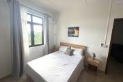 Flic en Flac for rent recent 2 bedroom apartment with swimming pool, gym, elevator and covered parking located in a secure residence.