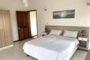 Flic en Flac for rent recent 3 bedroom apartment located in a beautiful residence 5 minutes walk from the beach and shops in a quiet area.
