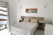 Flic en Flac for rent recent 3 bedroom apartment located in a beautiful residence 5 minutes walk from the beach and shops in a quiet area.