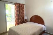 Flic En Flac for rent three bedroom duplex with swimming pool located in a secure complex in a quiet area and close to the beach and shops.