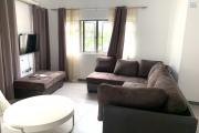 Flic En Flac apartment for rent with three en-suite air-conditioned rooms, communal swimming pool and parking.