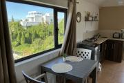 Rooftop Studio with Stunning Lagoon Views for Rent in Calodyne