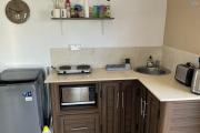 Rooftop Studio with Stunning Lagoon Views for Rent in Calodyne