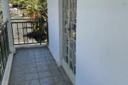For sale in Mont Choisy, 300m from the beach. 4-bedroom villa + rooftop terrace. Reserved for local market - rare investment opportunity.