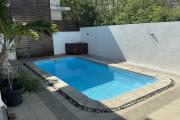 For sale in Mont Choisy, 300m from the beach. 4-bedroom villa + rooftop terrace. Reserved for local market - rare investment opportunity.