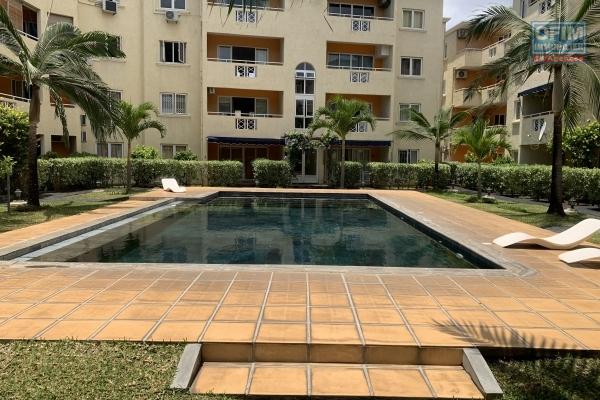 Flic En Flac for sale apartment located on the ground floor in a secure residence with swimming pool.