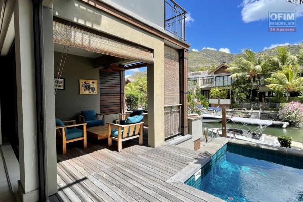 Black River for sale superb 3-bedroom duplex on the waterfront with a beautiful view of the mountains, located in the only residential marina of the island.