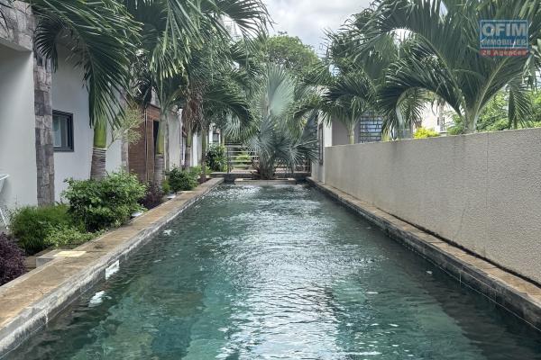 Flic en Flac for sale, accessible to foreigners, luxury 2-bedroom apartment with swimming pool.