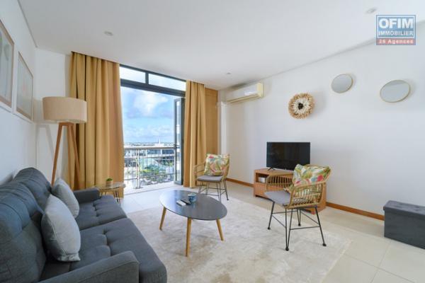 Apartment for sale accessible to foreigners (R+2) on Grand Baie La Croisette, 130 m2 duplex, sold furnished and equipped.