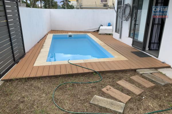 Flic En Flac apartment for rent with three en-suite air-conditioned rooms, communal swimming pool and parking.