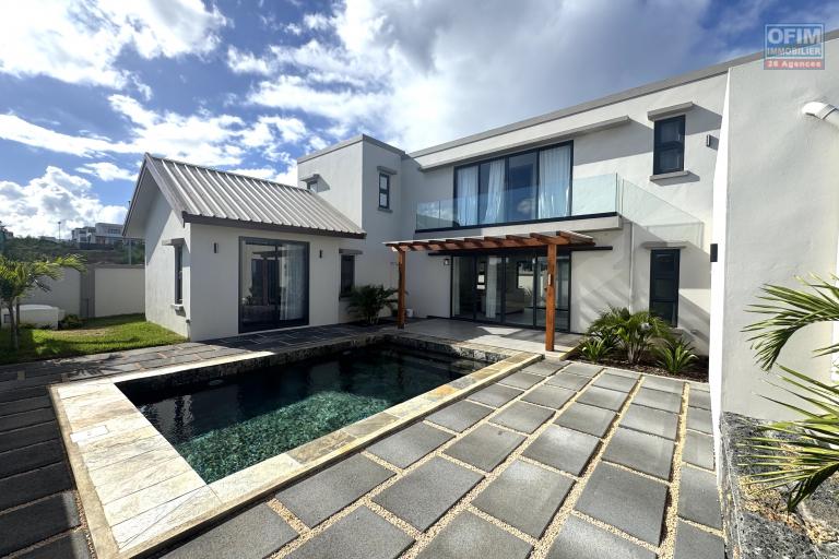 Flic en Flac for sale beautiful 4 bedroom villa delivery June 2025 with ocean view, swimming pool and garage located in a residential and secure area.