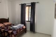 Flic en Flac à louer appartement 3 chambres avec piscine et jardiner situer dans une résidence sécurisée.