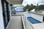 Flic en Flac à louer appartement 2 chambres avec 2 piscines situé dans une splendide résidence sécurisée à 500m de la plage et des commerces.