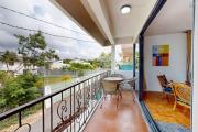 À VENDRE à Pereybere – Ensemble Immobilier de 2 Maisons Divisées en 4 Appartements  Quartier résidentiel calme, à quelques pas de la plage