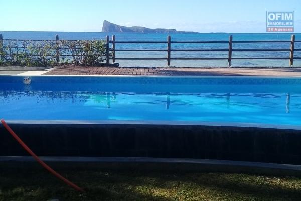 A vendre très bel appartement neuf pieds dans l'eau avec vue mer et vue Coin de Mire à couper le souffle à Bains Boeuf.