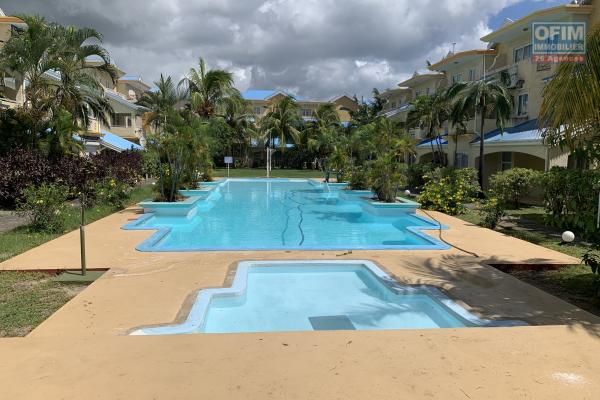 Flic En Flac à louer appartement trois chambres situé dans une résidence sécurisée avec deux piscine est proche de la plage et des commerces