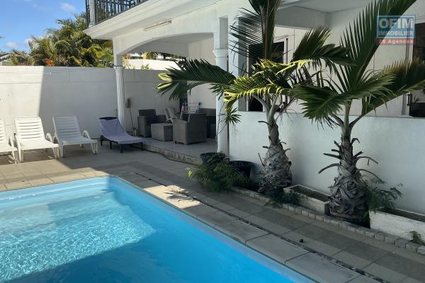 For sale in Mont Choisy, 300m from the beach. 4-bedroom villa + rooftop terrace. Reserved for local market - rare investment opportunity.